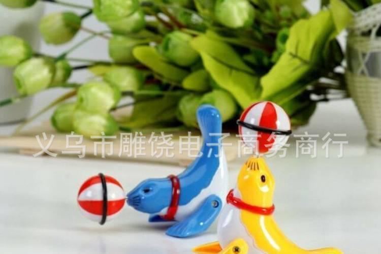 上鏈發條地攤貨玩具 海豚小海獅行走雜技頂球360度旋轉 廠家直銷示例圖2