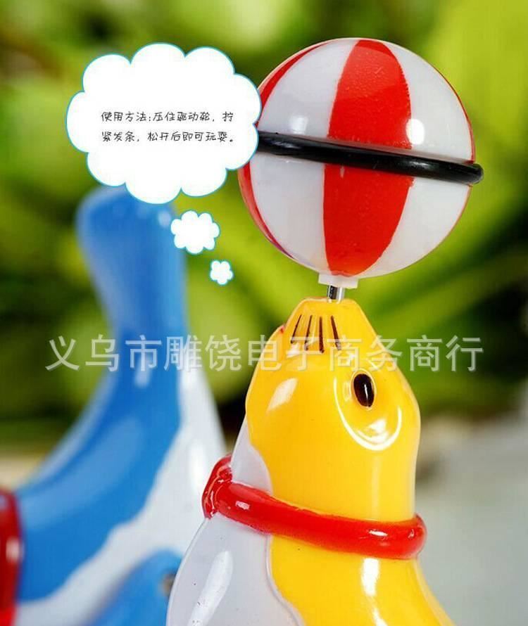 上鏈發條地攤貨玩具 海豚小海獅行走雜技頂球360度旋轉 廠家直銷示例圖3