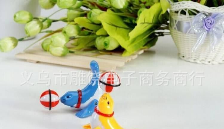 上鏈發條地攤貨玩具 海豚小海獅行走雜技頂球360度旋轉 廠家直銷示例圖6