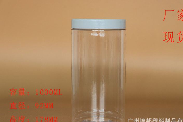 裝水1公斤PET透明圓柱白色蓋塑料食品瓶茶葉罐  廠家現貨包郵示例圖1