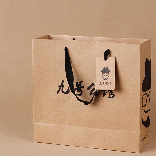 廠家定做牛皮紙服裝手提包裝紙袋定做可印logo手提外貿(mào)禮品紙袋子示例圖3
