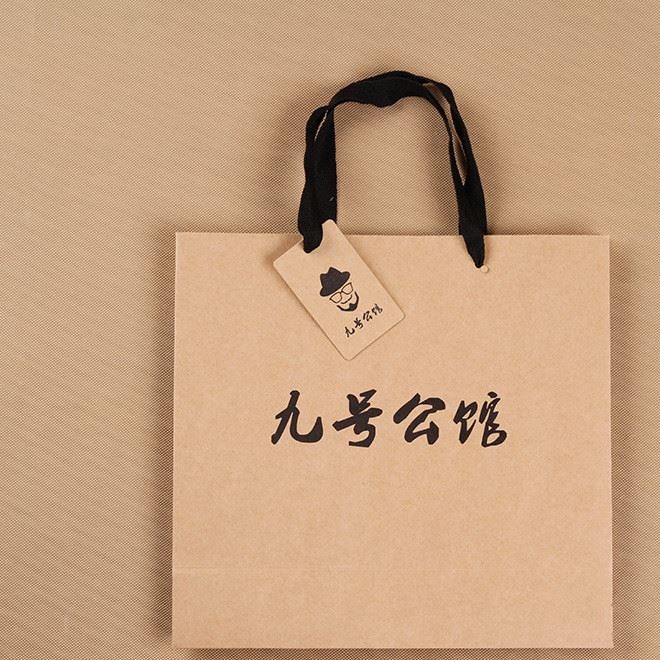廠家定做牛皮紙服裝手提包裝紙袋定做可印logo手提外貿(mào)禮品紙袋子示例圖5