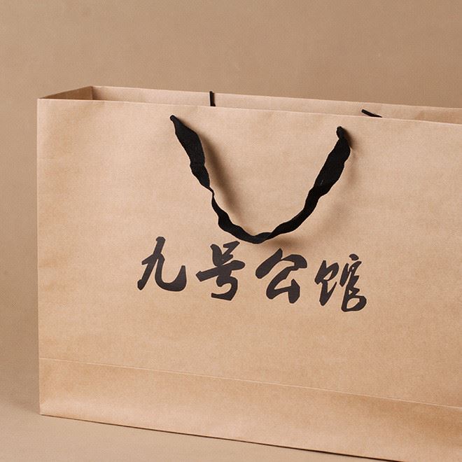 廠家定做牛皮紙服裝手提包裝紙袋定做可印logo手提外貿(mào)禮品紙袋子示例圖6